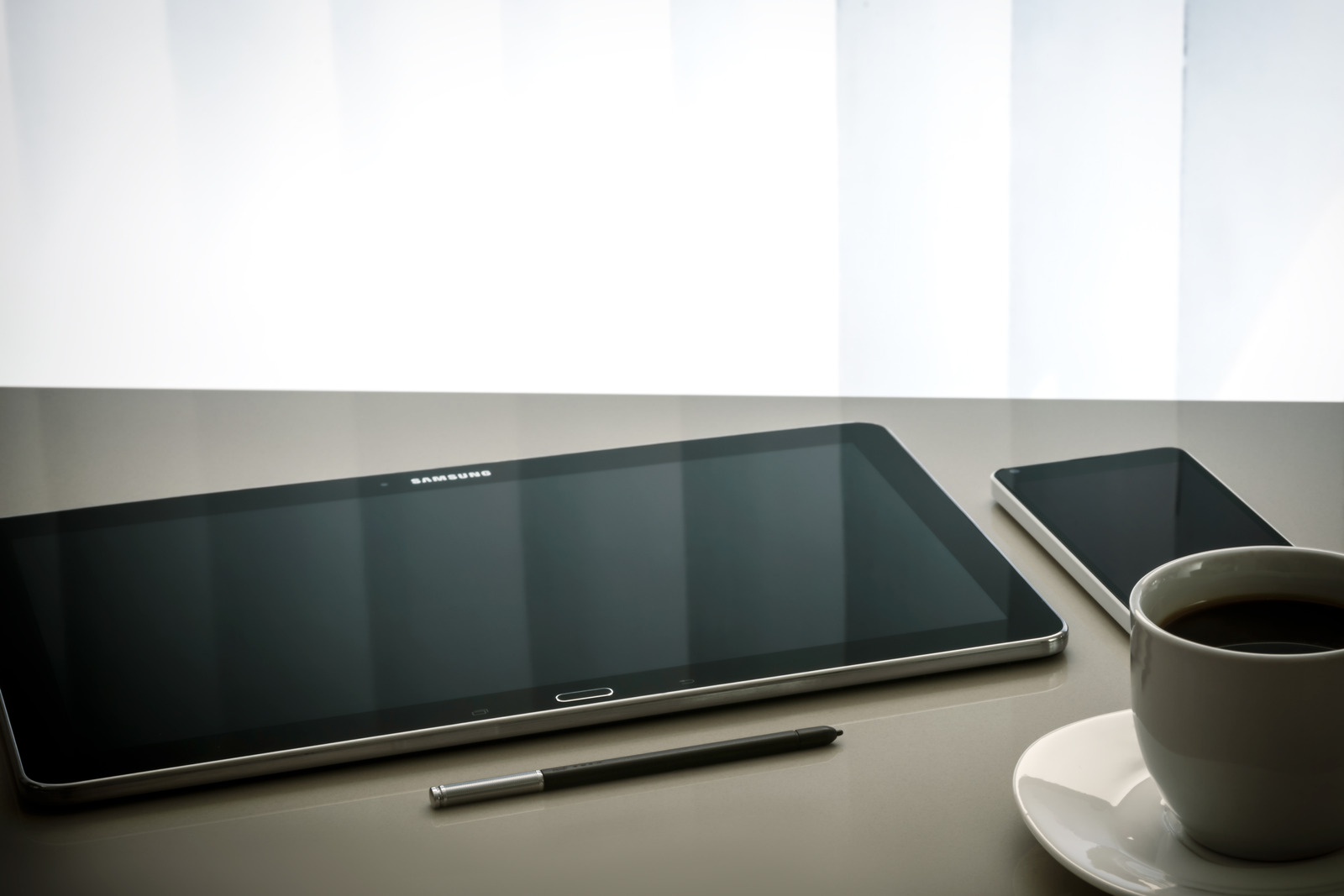 Canva – Black Samsung Android Tablet Computer Beside Stylus Pen