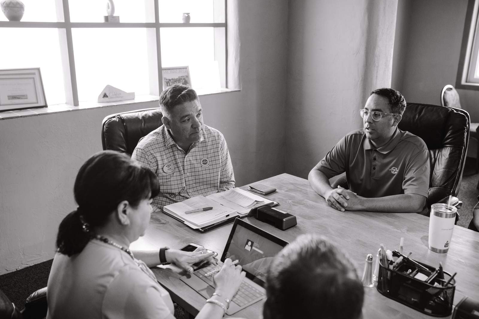 Canva – Grayscale Photo of People Inside A Room Having A Meeting