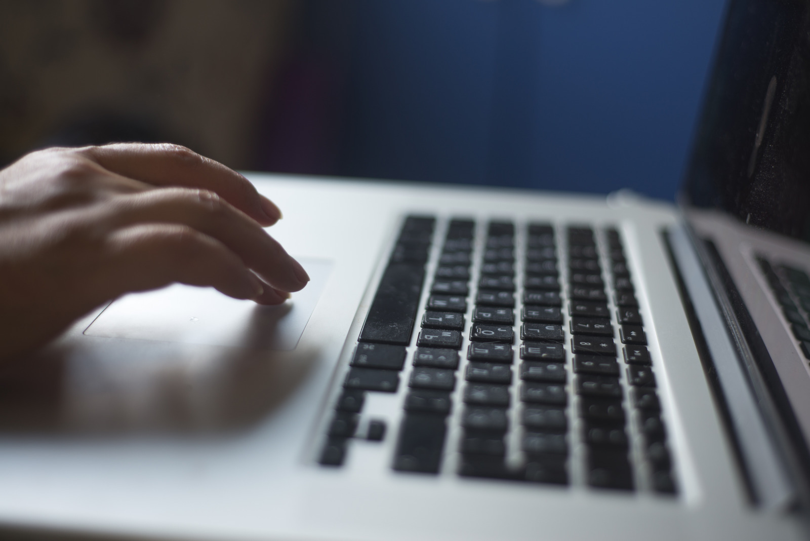 Programmer woman hacker hands type text on russian keyboard laptop